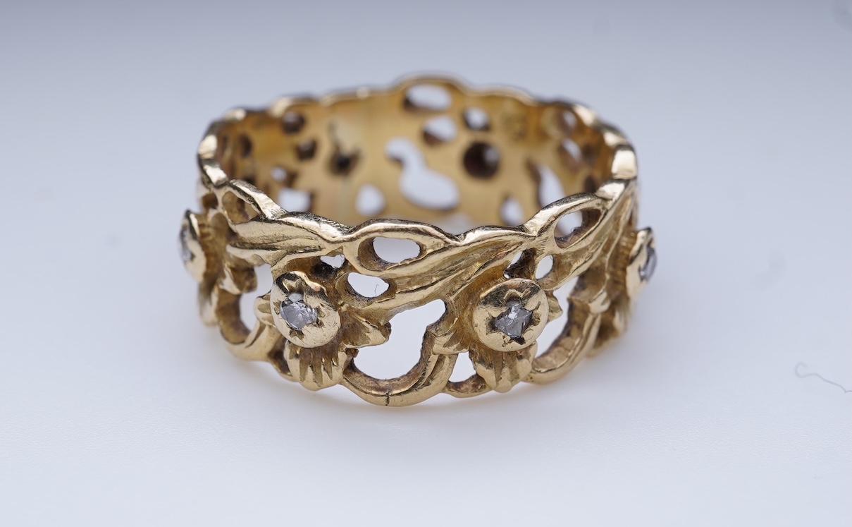 A gold and diamond eternity ring